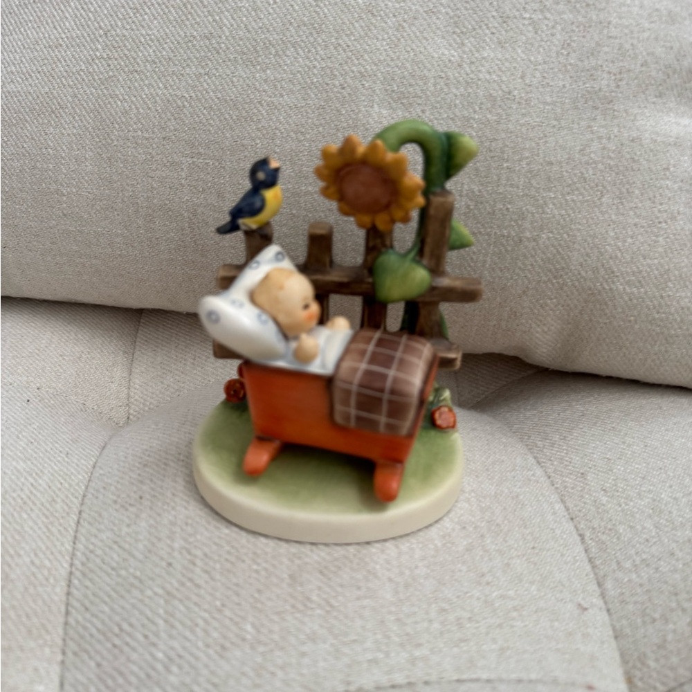 Charming Figurine with Sunflower and Bird